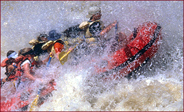 Enjoy a wet and wild whitewater rafting trip on one of Northern New Mexico's Wild and Scenic Rivers! Her rafters negotiate the thrilling Class 4 rapids of the upper Taos Box section of the Rio Grande.